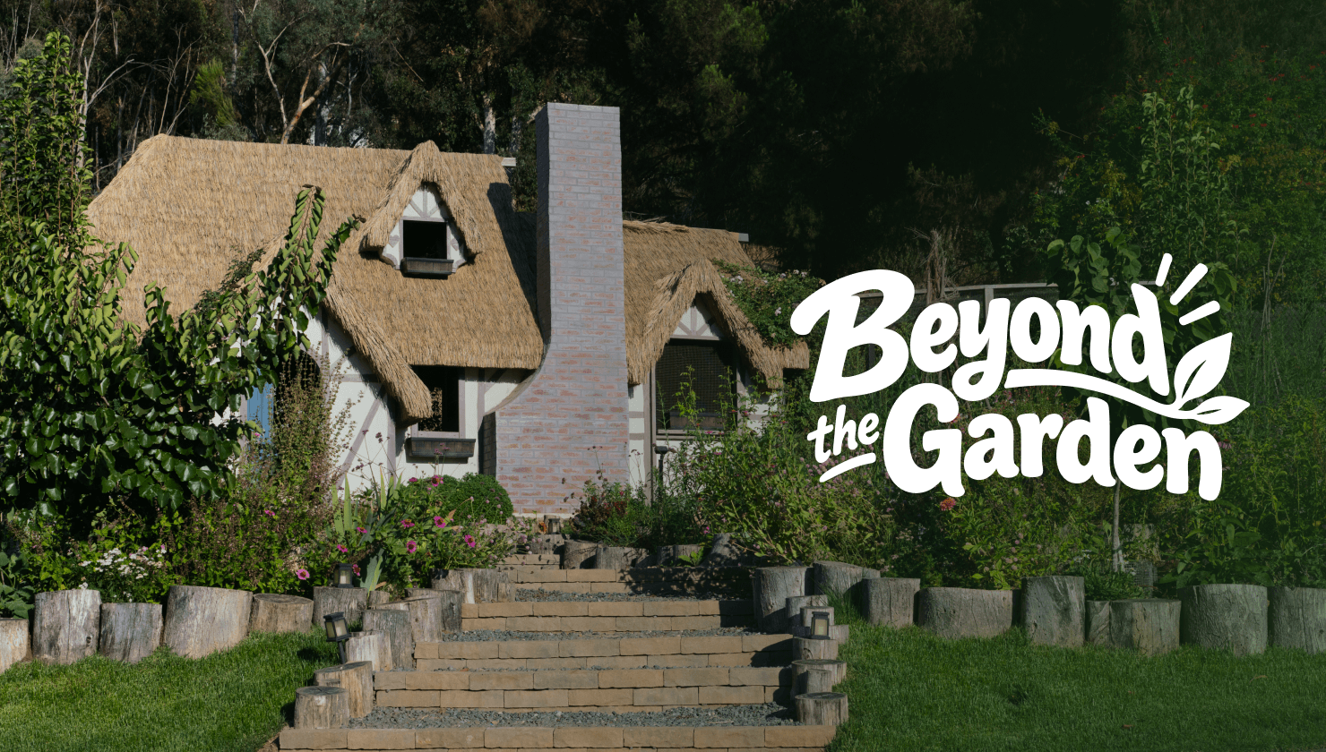 Beyond the Garden title card on a cottage garden path